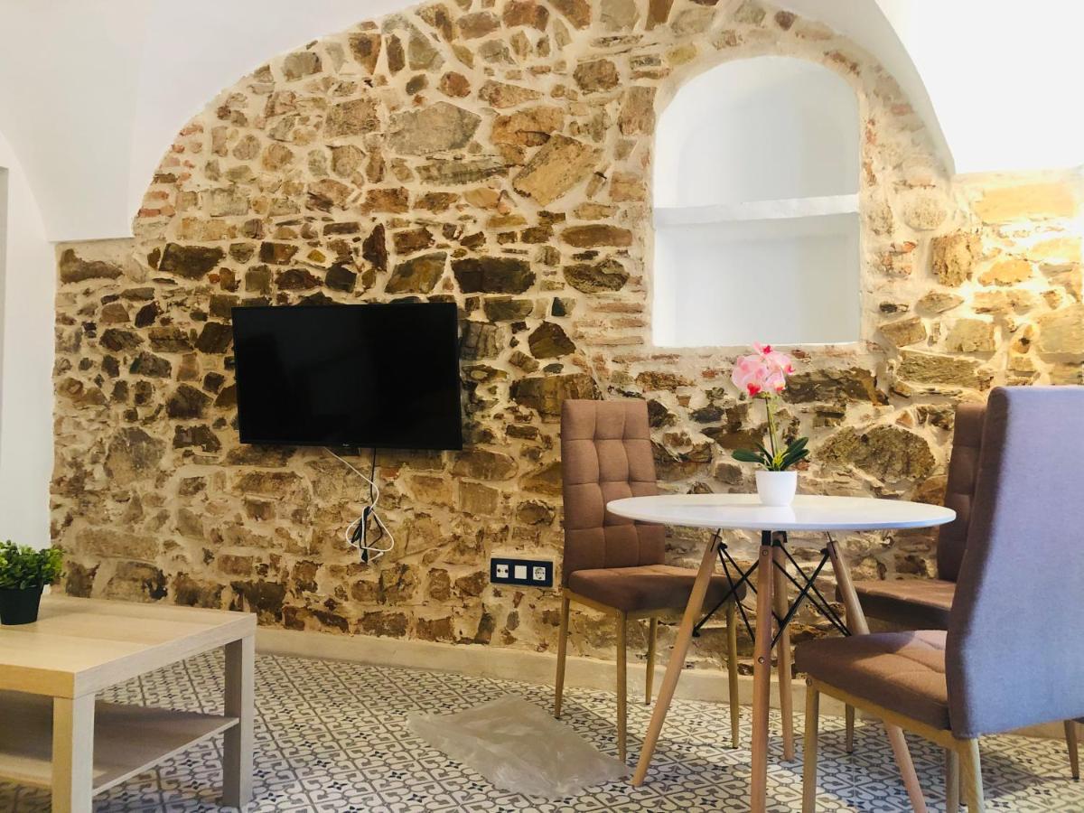 Al-Qazeres Suites Caceres Bagian luar foto